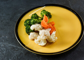 
Garnish of steamed or rolled vegetables