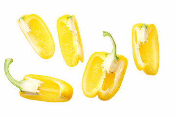 Set of fresh sliced yellow bell pepper isolated on white background. Top view