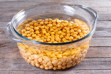 Chickpea in pan with water, cooking process