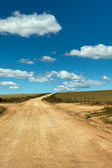 Scenic view of landscape and gravel road at Overberg district, South Africa.