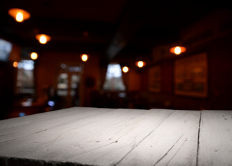 Classic bar counter with bottles in blurred background