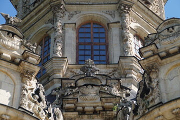 fragment of the exterior decoration of the Church of the Sign of the blessed virgin Mary in Dubrovitsy in Russia on a Sunny summer day - 17th century