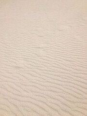 Fototapeta na wymiar Untouched sand with ripples.