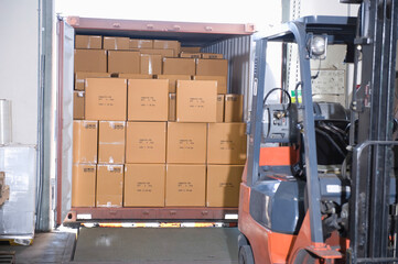 Boxes And Forklift Truck In Warehouse