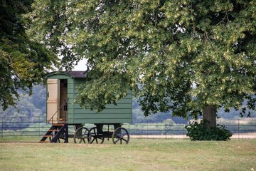 shepherds hut in the woods on a spring day