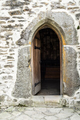 Fototapeta na wymiar Open medieval door. Old open door.