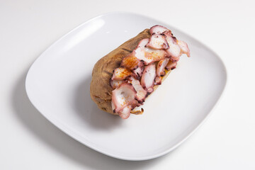 Delicious stuffed sweet potato with octopus