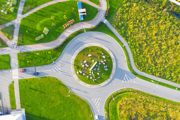 Aerial view small roundabout, also called a traffic circle, road circle, rotary.
