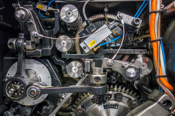 Fototapeta na wymiar 印刷機の駆動歯車群。精密機械、メカニカルイメージ