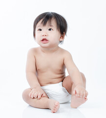 Cute healthy little Baby sitting isolated on white background
