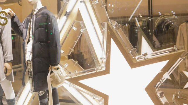 Clothing store window female winter season fashion holidays style