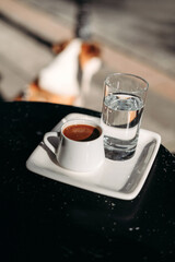 traditional oriental nougat with turkish coffee on a wicker tray