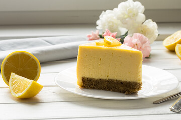 Lemon mouse cake. A slice of lemon cheesecake.