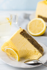 Dessert - Lemon mouse  Cheesecake. A slice of citrus cake with lemon and orange. half a lemon cake....