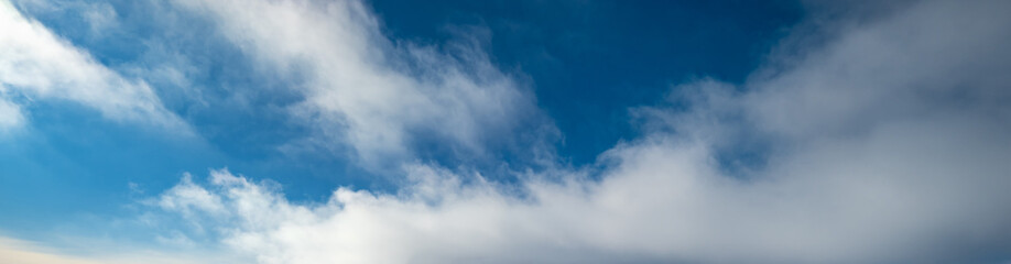 Obraz premium Blue sky with clouds, wide cloudscape background panorama