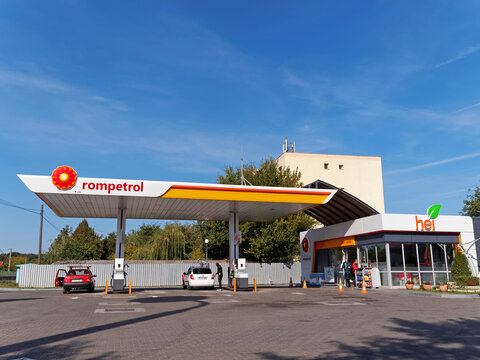 BUCHAREST, ROMANIA - OCTOBER 20, 2015. Rompetrol gas station with fueling car. Rompetrol is a Romanian oil company