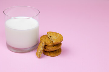 glass with milk and homemade cookie