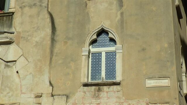 Architectural detail in ancient Split, Croatia, Venetian window in Peristil Square.