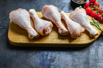 fresh raw chicken drumsticks meat for cooking on the table healthy meal snack top view copy space for text food background rustic keto or paleo diet