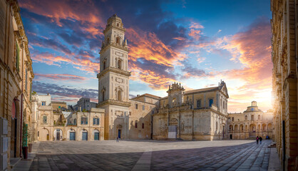 Panorama of Lecce, Puglia, Italy at sunset. Piazza del Duomo square, Campanile tower and Virgin...