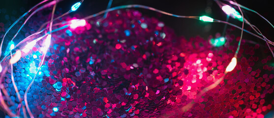 Colorful background with natural bokeh texture and defocused sparkling lights pattern. Blue and...