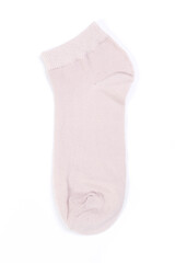 one pink short sock on a white background, top view