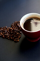 coffee beans heart and cup of coffee