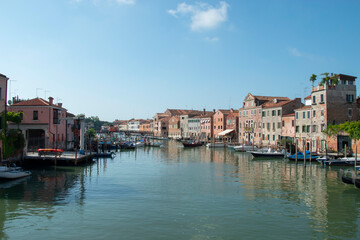 Obraz premium Sestiere di Castello in Venice with its characteristic buildings, with canals, bridges and alleys.