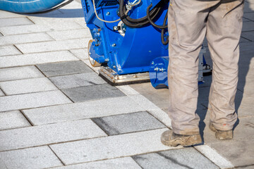 Surface preparation job on granite blocks paving
