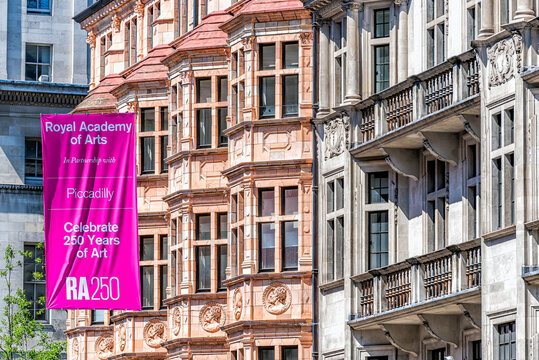 London, UK - June 22, 2018: Burlington House on Piccadilly Circus street with pink banner sign for Royal Academy of Arts