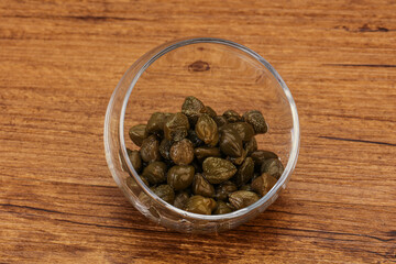 Tasty capers in the bowl