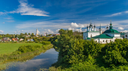 Fototapeta na wymiar old Russian church on the river
