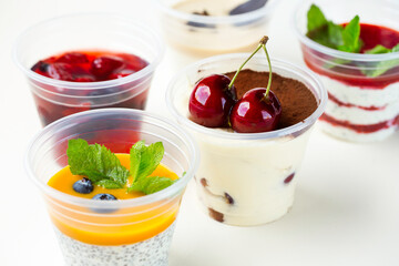 Fototapeta na wymiar panna cotta with berries. delivery of desserts to quarantine