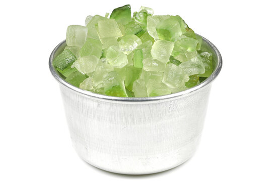 candied lemon peel in an aluminium bowl isolated on white background