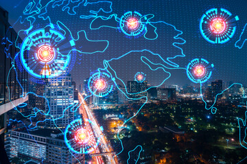 Hologram of Earth planet map on night panoramic cityscape of Bangkok, Asia. The concept of international companies. Multi Exposure.