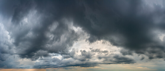 Naklejka na ściany i meble Fantastic dark thunderclouds, sky panorama