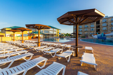 Public outdoor resort aeria with swimming pool