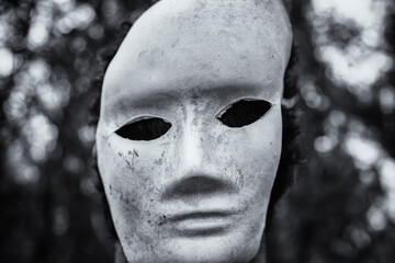 Scary mask in forest