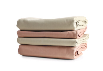 Stack of clean bed sheets isolated on white