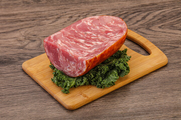 Beef ham piece over board