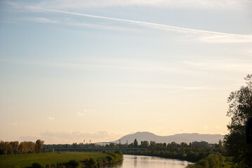 Landscape view of river Sava with railroad bridge and Samoborsko highlands in the distance, Zagreb, Croatia