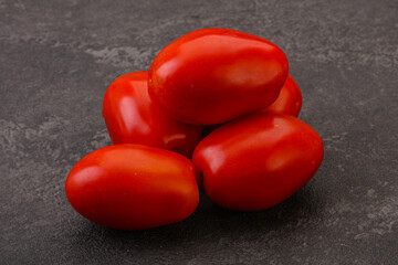 Red bright tasty tomato heap