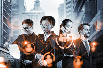 Group of SMM specialists working on social media marketing strategy to achieve business goals. Hologram icons over Singapore background.