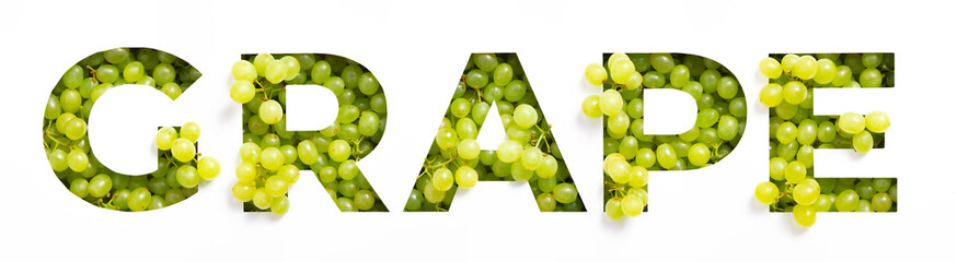 Lettering of English word grape of green fresh berries and cut paper isolated on white. Natural...