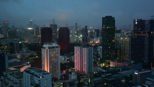 Timelapse of the night, rainy city. Night Bangkok. Thailand