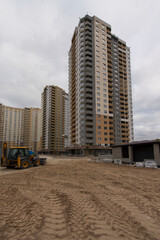 Laying the road, courtyard area. Construction site. production of apartments, social housing.