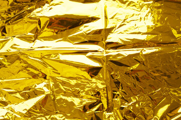 Bright holographic foil background. Bright color backdrop.