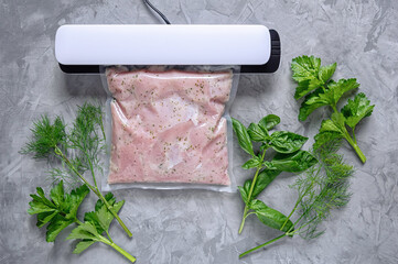 Marinating meat using technology sous vide in a vacuum bag. BBQ meat.