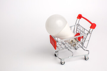 LED light bulbs on a cart, Isolated on white background. The concept of selling and buying business...