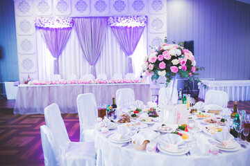 Interior of a restaurant prepared for wedding ceremony